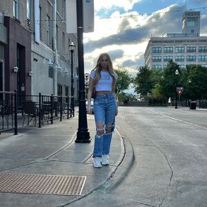 American Eagle high waist, baggy, distressed blue jeans, size US4 regular